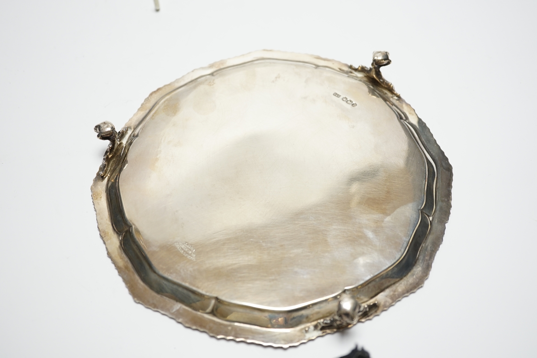 A George V silver waiter, of shaped circular form, on three claw and ball feet, Fordham & Fordham, Sheffield, 1923, 20.7cm, 10.6oz.